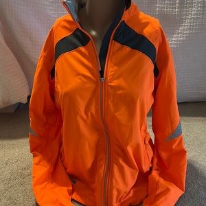 Saucony VIZIPRO Zip up jacket. Great condition! Size Med